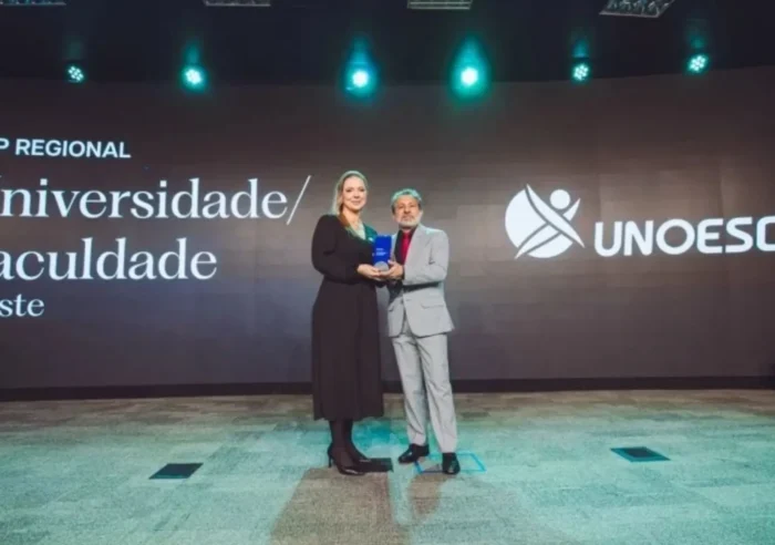 Arte institucional destacando a premiação da Unoesc no Top of Mind